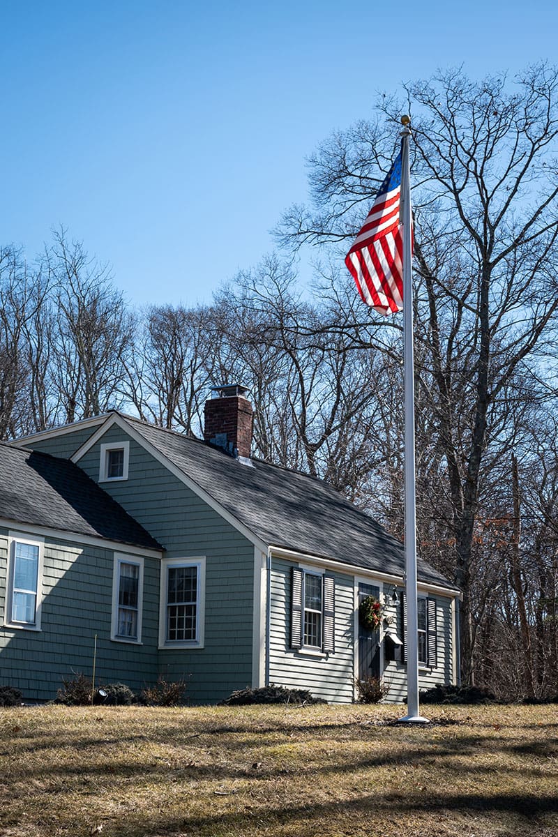 Flagpole septic vent in front yard of home