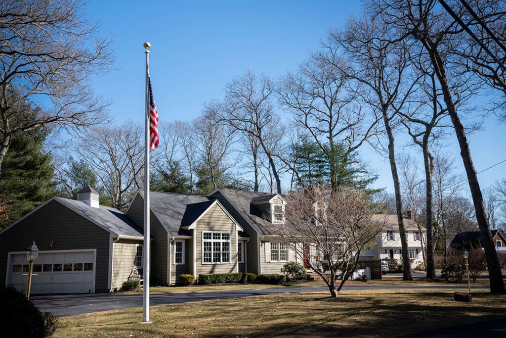 Flagpole septic vent in front yard of home