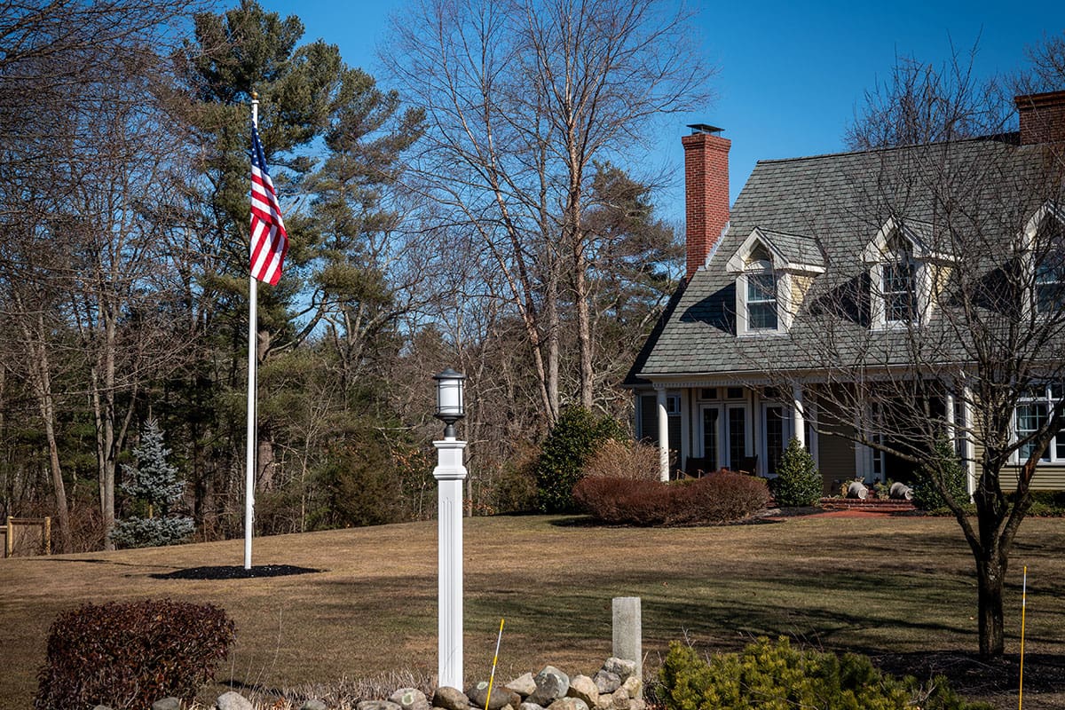 Flagpole septic vent in front yard of home